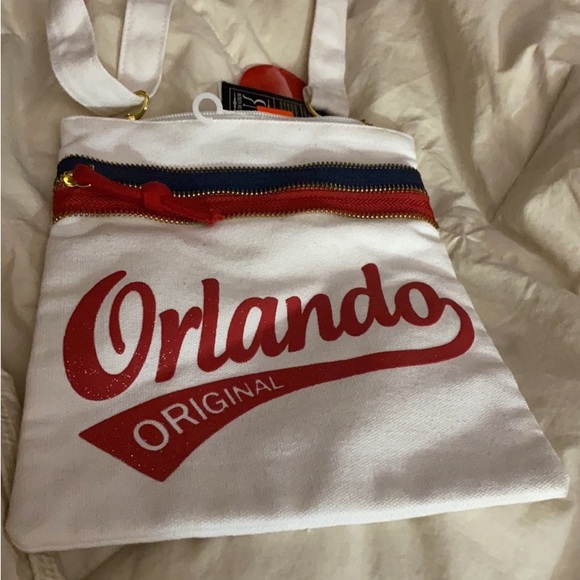 Orlando canvas cross body white bag with Orlando script in red double zipper - Picture 1 of 9